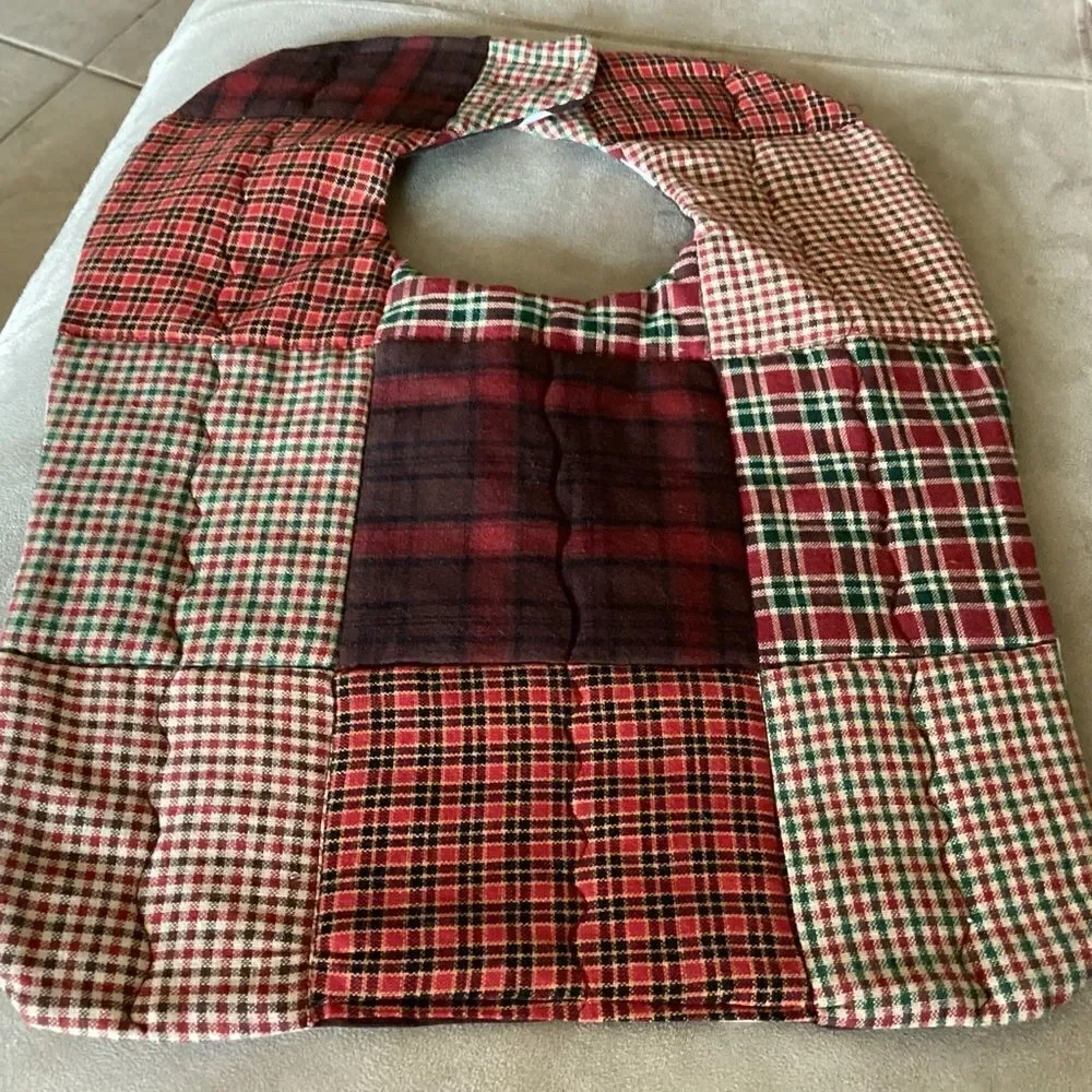 NWT. Handcrafted reversible, baby bib in brown and green shirting materials.